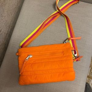 Sondra Roberts squared crossbody puffy bag. Orange color.